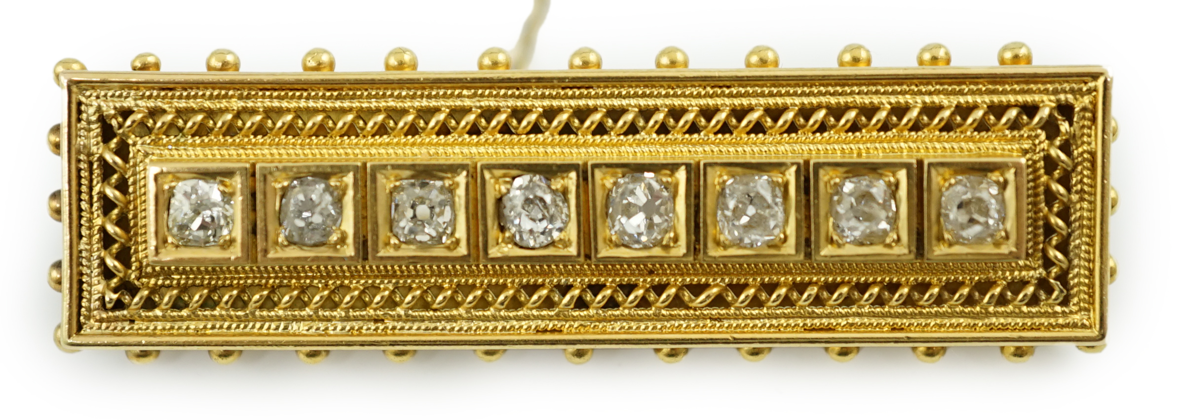 A late Victorian gold and eight stone diamond set brooch